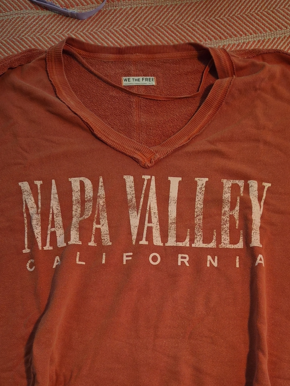 We The Free V-Neck Sweater in Rust with Napa Valley Graphic